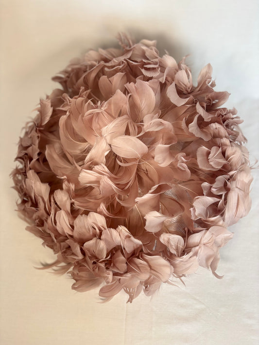 Blush feathered statement headpiece
