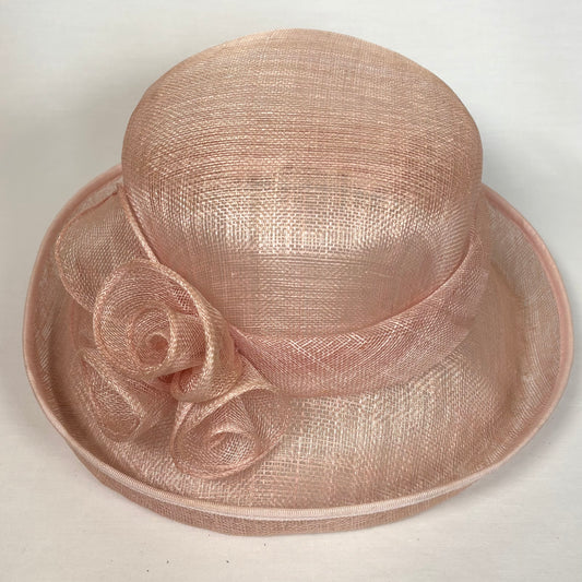 Pink occasion hat with up turn brim and flower detail