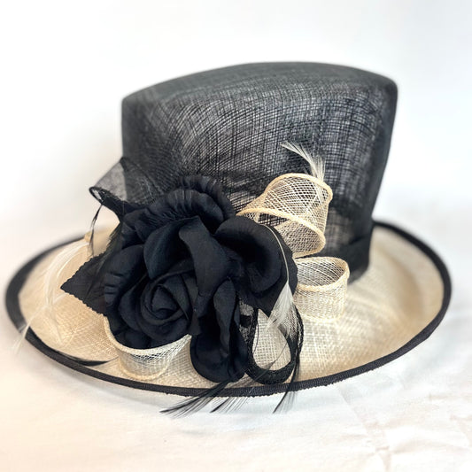 Black and White structured occasion hat with flower and bow design