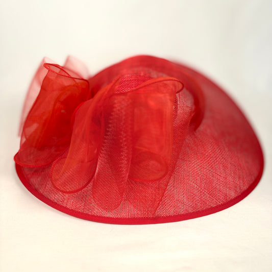 Red statement occasion hat with layered bow design