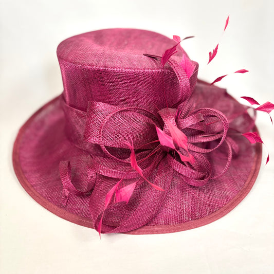 Burgandy occasion hat with flower and feather design