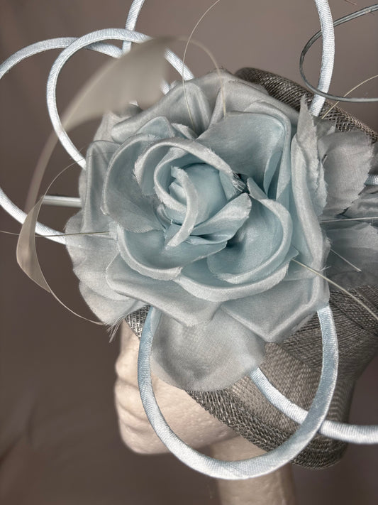 Pale Blue statement hatinator with detailed flower design