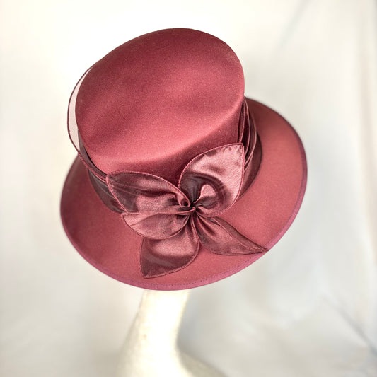 Maroon textured occasion hat with silk bow detail