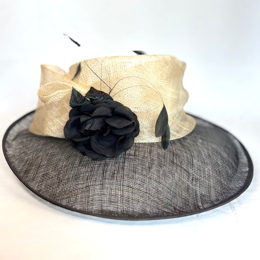 Black and White occasion hat with flower and feather detail