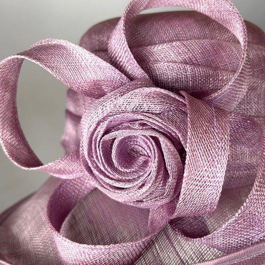 Mauve statement headpiece with layered flower design