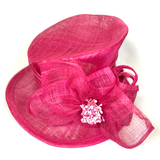 Rose coloured occasion hat with sculpted bow design