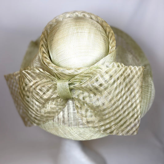 Light green wide-brim hat with statement bow design