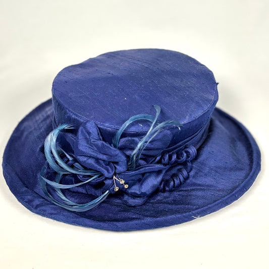 Bright Navy occasion headpiece with soft feather features