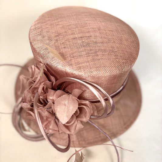 Blush sculpted occasion hat with feature flower design