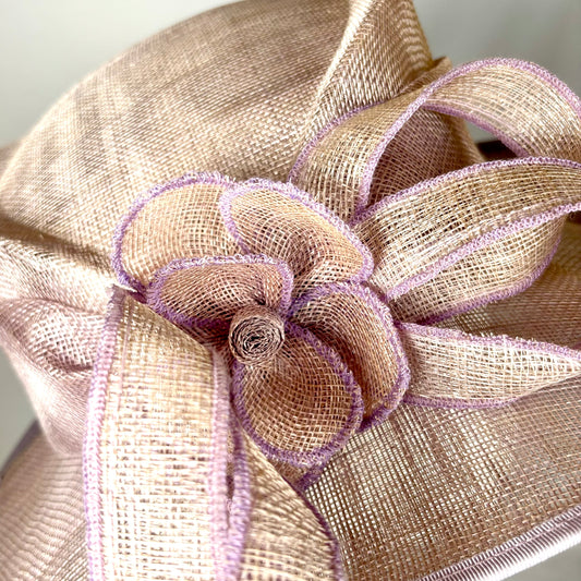 Blush pink structured occasion hat with flower detail