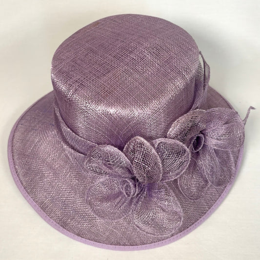 Mauve occasion hat with sculpted flower detail
