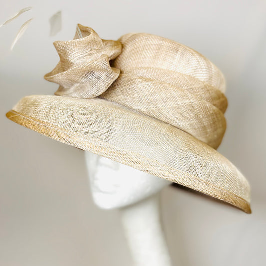 Cream occasion hat with sculpted feature flower
