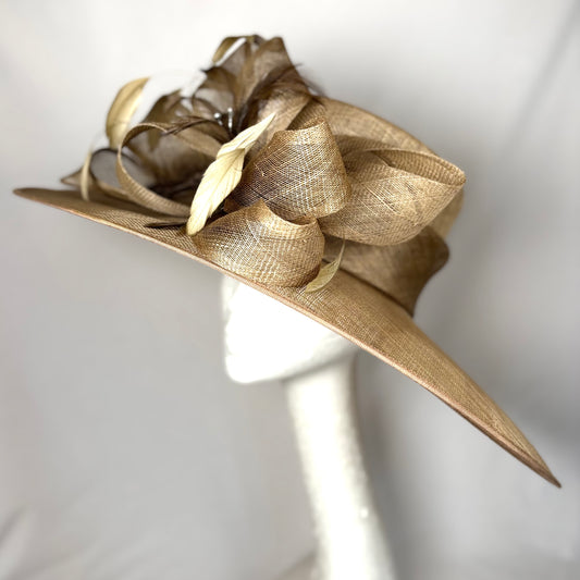 Brown wide-brim statement hat with sculptured detailing