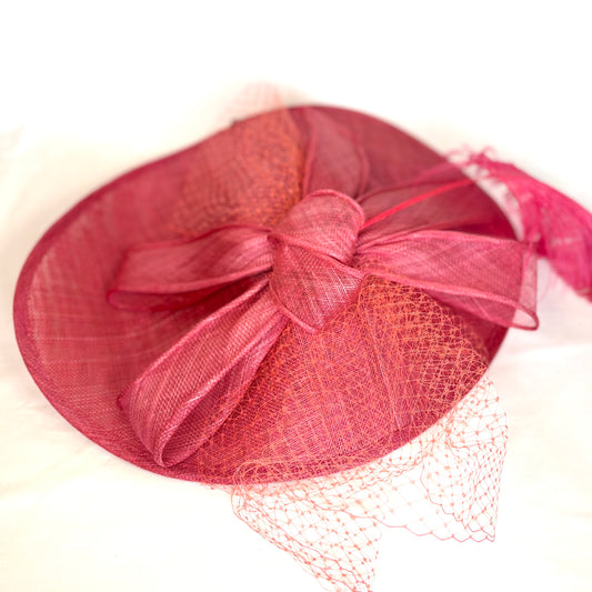 Red hatinator with bow and net design