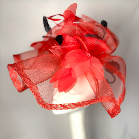 Red hatinator with fine black feather detail