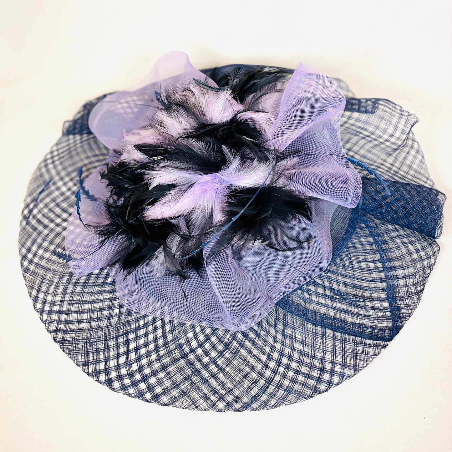 Navy and purple feathered statement headpiece