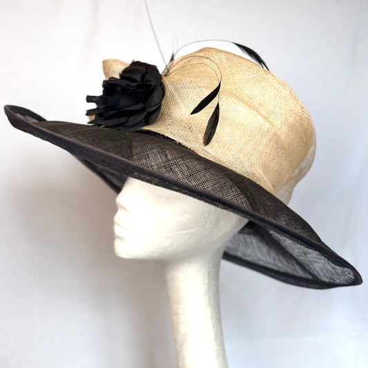Black and White occasion hat with flower and feather detail