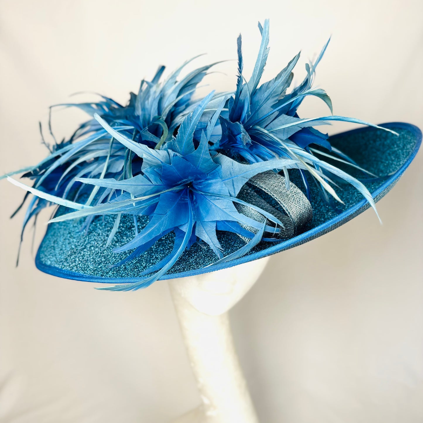 Blue feathered wide-brim occasion hat