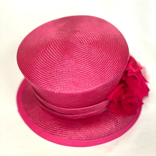 Rose coloured structured occasion hat with textured finish
