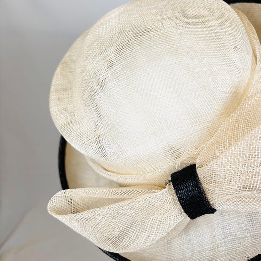 Cream and Navy sculpted hat with classic bow detail