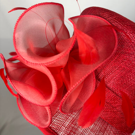 Red structured occasion hat with bold bow design