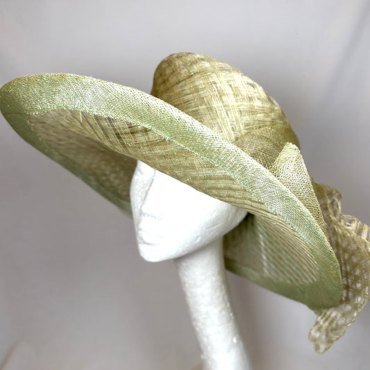 Light green wide-brim hat with statement bow design