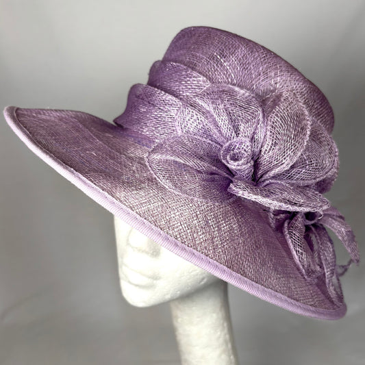 Mauve occasion hat with sculpted flower detail