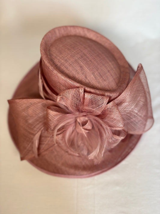 Blush occasion hat with bold structured bow design