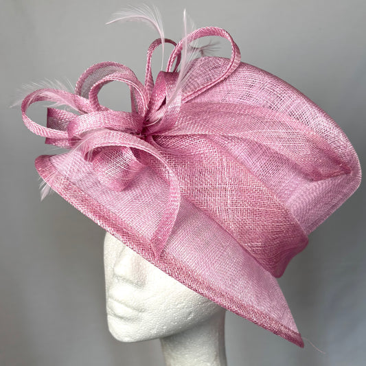 Soft Blush occasion hat with structured flower and feather detail
