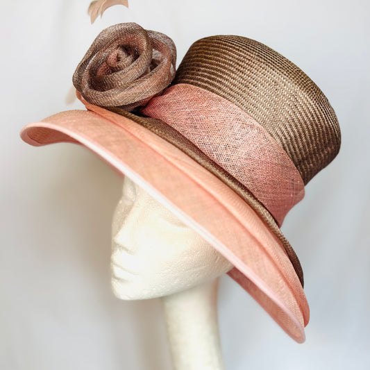 Pink two-tone occasion hat with sculpted flower design