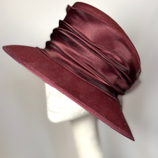 Maroon textured occasion hat with silk bow detail