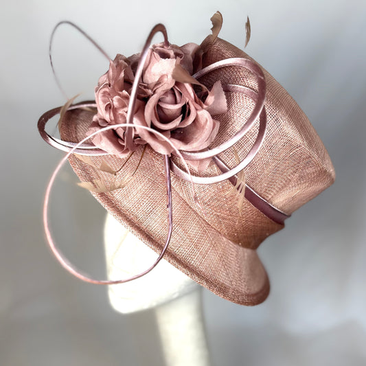 Blush sculpted occasion hat with feature flower design