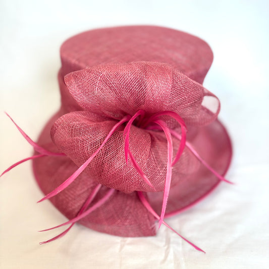 Maroon occasion hat with structured flower and feather detail