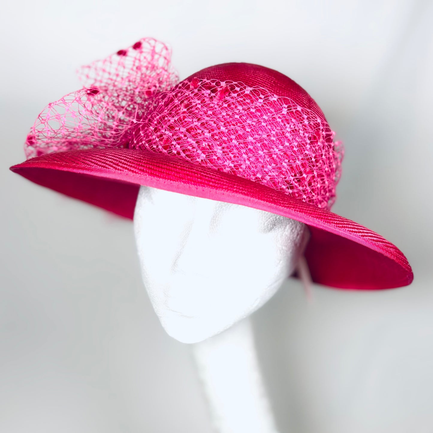 Cerise dome headpiece with net detail