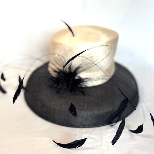 Cream and Black occasion hat with bold feather design