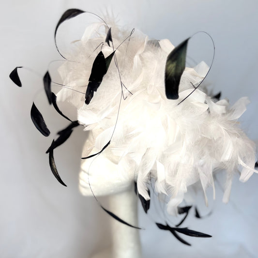 White feathered statement piece with black accent feathers
