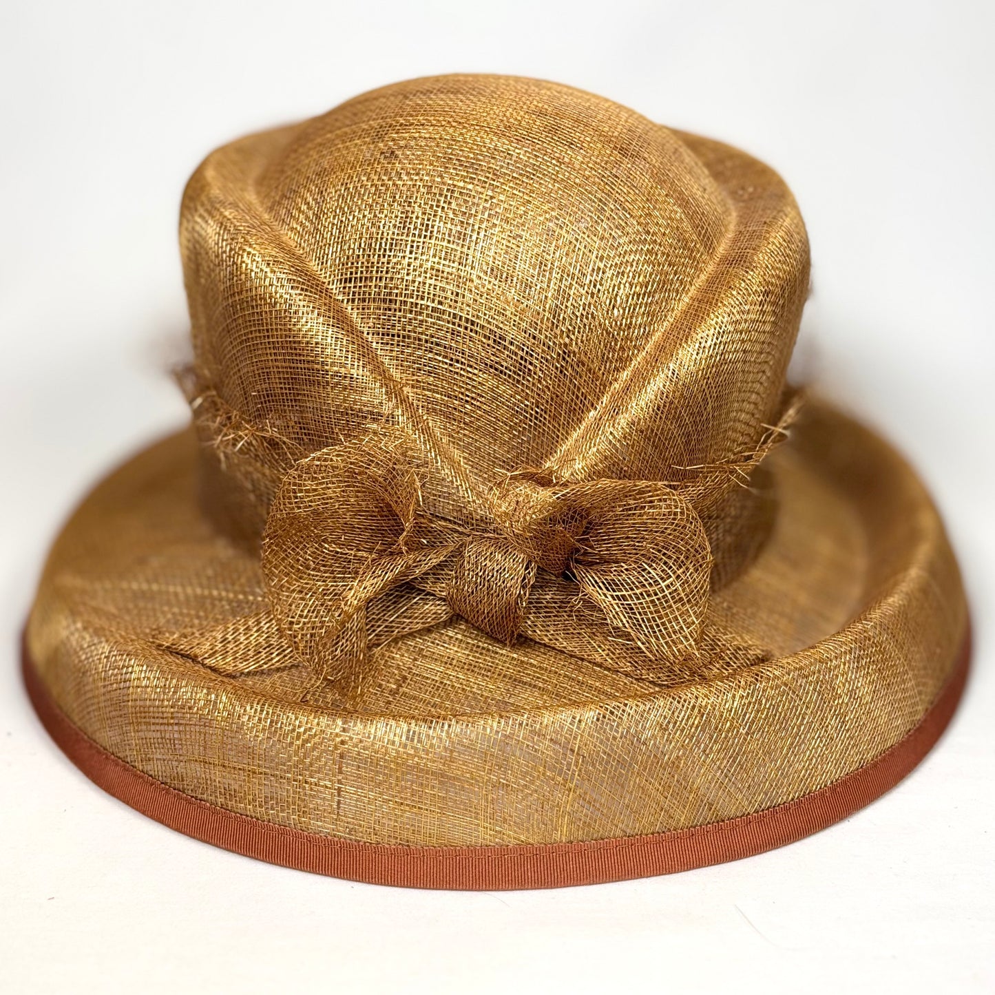 Straw headpiece in tan with trim detail